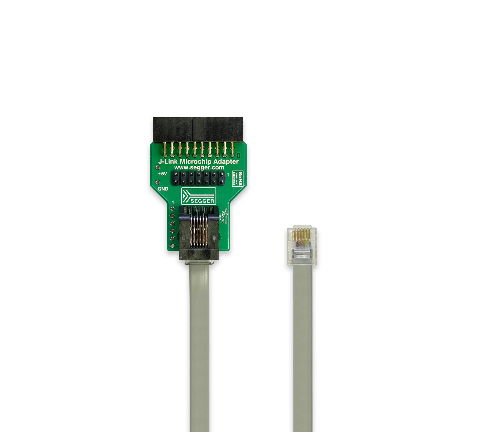 Microchip LVP Adapter Image of a J-Link Microchip Adapter. The adapter features a green circuit board with pins and markings, connected to a gray cable ending in a small rectangular connector. It is used for programming or debugging microcontrollers.